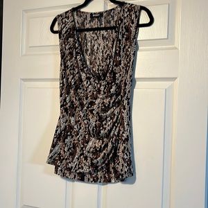 Beautiful sleeveless blouse draped